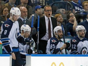 Jets coach Paul Maurice yells toward the officials during the second period against the Tampa Bay Lightning on Thursday. He got a game misconduct at the end of the period. (AP Photo/Mike Carlson)