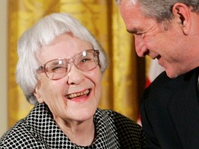 American novelist Harper Lee (L) is awarded the  Presidential Medal of Freedom by U.S. President George W. Bush in the East Room of the White House in Washington in this file photo taken November 5, 2007.  REUTERS/Larry Downing/Files