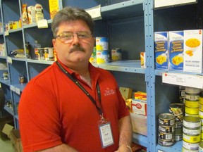 Executive director Myles Vanni is shown at the Inn of the Good Shepherd food bank on Friday February 19, 2016 in Sarnia, Ont. The John Street agency put out a call this week for donations to help restock the shelves.
Paul Morden/Sarnia Observer/Postmedia Network