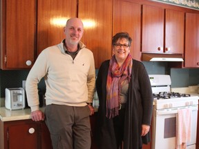 The family of 14 Sudanese refugees arrived in Goderich on Feb. 17. A lot of hard work and preparation from volunteers with the Welcome Project has gone into making their arrival happen. Pictured here Daryl Gilroy and Rev. Kate Ballagh-Steeper in the kitchen of the family’s new home. (Laura Broadley/Goderich Signal Star)