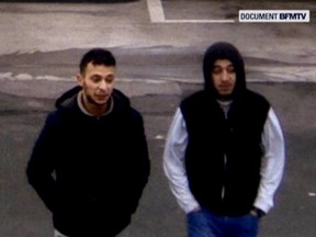 Paris shooting suspect, Salah Abdeslam, and suspected accomplice, Hamza Attou, are seen at a petrol station on a motorway between Paris and Brussels, in Trith-Saint-Leger, France in this still image taken from a November 14, 2015 video provided by BFMTV on January 11, 2016.  REUTERS/BFMTV via Reuters