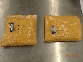 Packages containing a total of four kilograms of suspected heroin was seized and turned over to the Royal Canadian Mounted Police (handout)