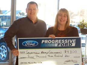 Progressive Ford's Jered Sweet donates $4,200 to Gerri St. Pierre, Family Services Caseworker with the Wallaceburg Salvation Army. The money was raised through Progressive Ford's Christmas Toy and Food Drive. Along with food and toys that they donated, Progressive Ford donated $100 for every car they sold in November of last year