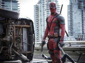 This image released by Twentieth Century Fox shows Ryan Reyonlds in a scene from the film, "Deadpool." (Joe Lederer/Twentieth Century Fox Film Corp.)