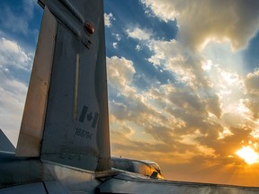 A Cold Lake CF-18 Hornet from Air Task Force-Iraq during sunset during Operation IMPACT in Kuwait on February 1, 2015. Canadian Forces/Combat Camera/DND