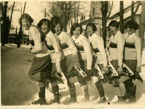 Queen’s University Archives 
Queen’s Elizabeth Graham, second from right, was the first goalie to wear a mask, donning a wire fencing mask during a game on Feb. 7, 1927.