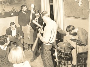 In a classic image, the Nihilist Spasm Band?s Murray Favro. left, with guitar, bassist Hugh McIntyre, slide clarinet player Archie Leitch, kazoo master Art Pratten and drummer Greg Curnoe share the noise at the old York hotel in downtown London on Dec. 19, 1966. Free Press photographer Ernie Lee positioned himself close to the action for the shot. (London Free Press files)
