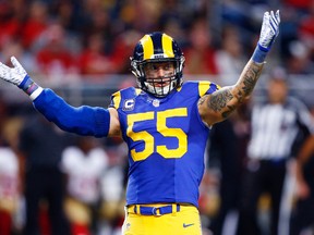 In this Sunday, Nov. 1, 2015 file photo, St. Louis Rams middle linebacker James Laurinaitis celebrates during the fourth quarter of a game against the San Francisco 49ers in St. Louis. (AP Photo/Billy Hurst, File)