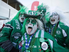 Saskatchewan Roughriders fans pose prior to the103rd CFL Grey Cup game between the Ottawa RedBlacks and the Edmonton Eskimos in Winnipeg last November. Commonwealth Stadium is expected to see a lot of this in 2016. (File)