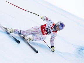 Lindsey Vonn of the US speeds down the course during a women's Alpine ski downhill race, in La Thuile, Italy, Saturday, Feb. 20, 2016. (AP Photo/Marco Trovati)