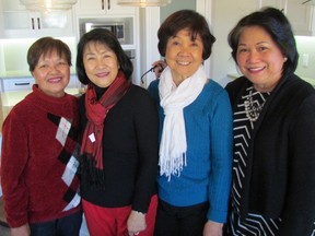 A group of four friends from Sarnia, from left, Blessa Hindley, Adel Quijalvo, Teresita Lane and Violet Rao, held the winning ticket for the grand prize in Friday's Bluewater Health Foundation Dream Home Lottery. The group toured the home on Manhattan Drive on Saturday February 20, 2016 in Sarnia, Ont. Paul Morden/Sarnia Observer/Postmedia Network