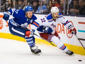 Toronto Maple Leafs Leo Komarov and New York Rangers Dan Boyle during first period action in Toronto on Thursday February 18, 2016. (Ernest Doroszuk/Toronto Sun/Postmedia Network)