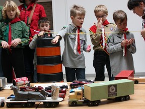 Scouts judge for best car design at the 2016 Kub Kar and Scout Truck Race and Rally  in Kingston, Ont. on Saturday February 20, 2016. Steph Crosier/Kingston Whig-Standard/Postmedia Network