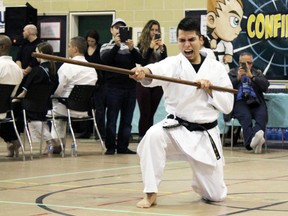 David Orezco, from Prodigy Martial Arts, competes in the weapons division at the 21st Annual Ken Tallack Karate/Kung-Fu Championships in Kingston, Ont. on Saturday February 20, 2016. Steph Crosier/Kingston Whig-Standard/Postmedia Network