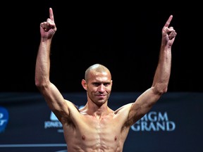 In this Jan. 22, 2015 file photo, lightweight fighter Donald Cerrone gestures during the weigh-in for UFC 182 in Las Vegas. (L.E. Baskow/Las Vegas Sun via AP)