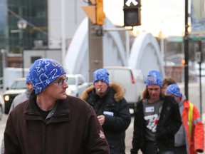Participants in the Coldest Night of the Year fundraising walk hit the streets in downtown Belleville on Saturday February 20, 2016 in Belleville, Ont. The annual walk helps to keep Nightlight Belleville's drop-in centre up and running. Tim Miller/Belleville Intelligencer/Postmedia Network