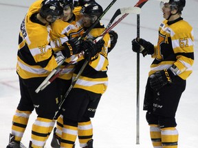 Kingston Frontenac's Michael Dal Colle gets his 300th Ontario Hockey League point with a pass to Spencer Watson to score the first goal against the Niagara Ice Dogs.  The Fronts defeated the Ice Dogs 4-0 at the Rogers  KRock Centre in Kingston, Ont. on Sunday February 21, 2016. Steph Crosier/Kingston Whig-Standard/Postmedia Network