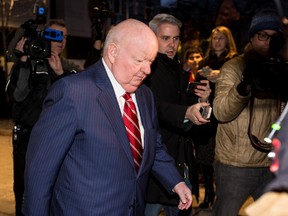 Senator Mike Duffy leaves the Ottawa Courthouse after testifying in his own defence at his trial in Ottawa, Ont. on Tuesday December 8, 2015. Errol McGihon/Ottawa Sun/Postmedia Network