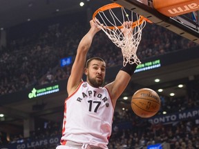 Toronto Raptors centre Jonas Valanciunus scores against Memphis Grizzlies during first-half action at the Air Canada Centre in Toronto on Feb. 21, 2016. (THE CANADIAN PRESS/Chris Young)