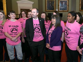 Anti-bullying youths gathered with Kingston Mayor Bryan Paterson and Kingston and the Islands MPP Sophie Kiwala at City Hall on Feb. 12 to film a video about what each level of government plans to do to fight bullying. (Ian MacAlpine/The Whig-Standard)