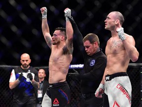 James Krause (red gloves) is announced as the winner by decision against Shane Campbell during UFC Fight Night at the Consol Energy Center in Pittsburgh on Feb. 21, 2016. (David Dermer/USA TODAY Sports)