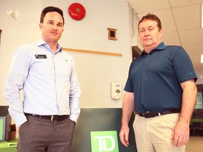 From the left, Jason Baird and Dave Maddocks from Seaforth’s TD Canada Trust were on hand at the special agriculture seminar. (Shaun Gregory/Huron Expositor)