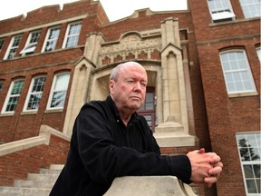 Former Edmonton Public School Board chairman Dave Colburn poses in front of Garneau school in 2011.