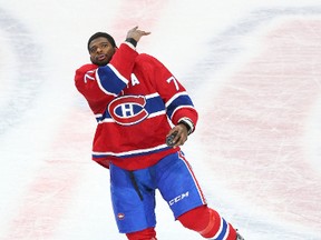 Canadiens defenceman P.K. Subban (76) gives away a puck as he is named first star of the game against the Flyers at the Bell Centre in Montreal on Friday, Feb. 19, 2016. (Jean-Yves Ahern/USA TODAY Sports)