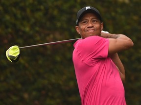 Tiger Woods hits a shot at Augusta National Golf Club in Augusta, Georgia during a practice round for the 2015 Masters Golf Tournament. (AFP/TIMOTHY A. CLARY)
