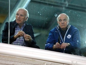 Maple Leafs Special Assignment Coach Jacques Lemaire (left) sits with Leafs GM Lou Lamoriello at practice in Toronto on Monday, Feb. 22, 2016. (Michael Peake/Toronto Sun)
