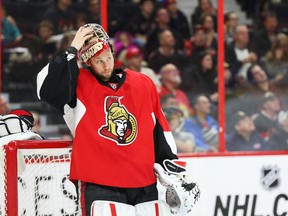 Craig Anderson of the Ottawa Senators shows his disbelief and dejection after the Detroit Red Wings scored a goal during second-period NHL action at Canadian Tire Centre in Ottawa on Feb. 20, 2016. (Jean Levac/Postmedia)