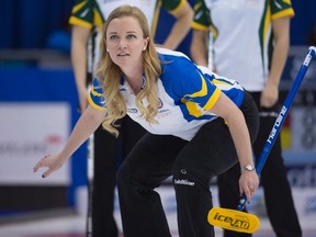Albera skip Chelsea Carey watches her shot during the sixth draw against Northern Ontario at the Scotties Tournament of Hearts, in Grande Prairie, Alta., on Feb. 22, 2016. (THE CANADIAN PRESS/Jonathan Hayward)