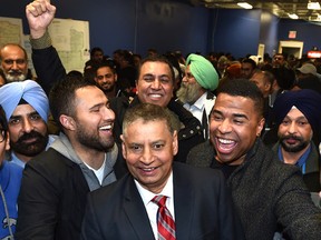 Moe Banga celebrating his win with supporters in the Ward 12 byelection at his campaign headquarters on Monday. (ED KAISER)