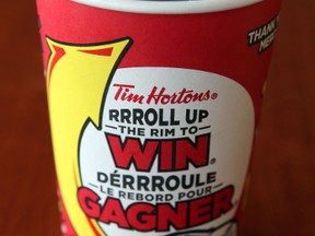 A Tim Horton's Roll Up The Rim cup is pictured in this file photo. (Tony Caldwell/Ottawa Sun/Postmedia Network)
