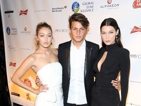 (L to R) Gigi Hadid, her brother Anwar and sister Bella are all in the modelling business. (Andres Otero/WENN.com)