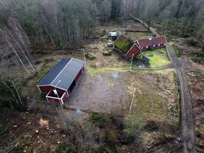 An aerial view of the farm of 38-year-old Swedish doctor Martin Trenneborg, with specially constructed soundproof bunker seen at left, is pictured in this Feb. 11, 2016 file photo. A Stockholm court sentenced Martin Trenneborg on Feb. 23, 2016, to 10 years in prison for abducting a woman and locking her up in a homemade bunker, but acquitted him of charges of aggravated rape. (Johan Nilsson/TT via AP)