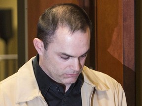 Guy Turcotte leaves the courtroom at the Saint Jerome courthouse in Saint Jerome, Que., on Dec. 5, 2015. (THE CANADIAN PRESS/Graham Hughes)