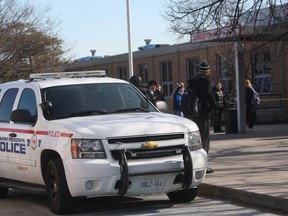 Durham Regional Police at the scene in Pickering Tuesday, Feb. 23, 2016 after six students and two staff members were injured when a teenage girl went on a stabbing rampage at Dunbarton High School. (CHRIS DOUCETTE/TORONTO SUN)