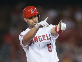 Los Angeles Angels slugger Albert Pujols celebrates during a game against the Oakland Athletics, Tuesday, Sept. 29, 2015, in Anaheim, Calif. (Kevin Sullivan/The Orange County Register via AP)