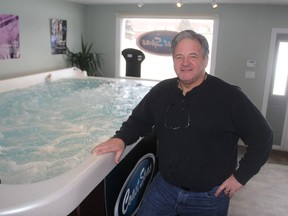 Peter Murphy stands inside his pool business on Bath Road in Kingston on Friday, which he started up with partner Shawn Payne last spring. Murphy has spent 40 years in the pool business. (Michael Lea/The Whig-Standard)