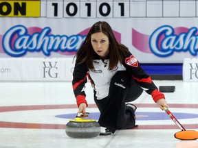 Ontario skip Jenn Hanna delivers a rock during the first draw of the Scotties Tournament of Hearts in Grande Prairie, Alta., on Saturday, Feb. 20, 2016. (Logan Clow/Postmedia Network)