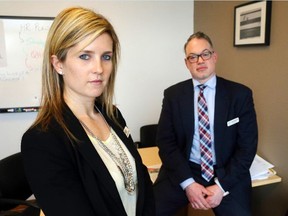 Luke Hendry/The Intelligencer
Quinte Health Care's interim human resources co-ordinator, Bree Ricketts-Gaber, joins vice-president Jeff Hohenkerk in his office at Belleville General Hospital in Belleville Tuesday. They said talks between staff and unions are reducing the number of jobs to be lost as a result of the corporation's latest restructuring.