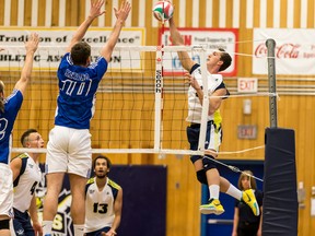 NAIT Ooks' Jordan Teliske hits the ball against Keyano Huskies' Alex Andryszewski in a match Nov. 20 at NAIT Gym. Both teams will be playing in this week’s ACAC championships. (Supplied)