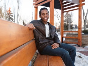 Emmanual Nnamani, 17, poses for a photo near his Westmount home in Edmonton, Alta., on Sunday, February 21, 2016. He received a $5,000 scholarship through the Horatio Alger Association to pursue an education in science. Photo by Ian Kucerak