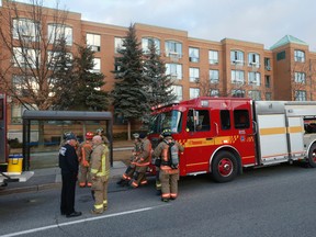 Fire officials at the scene of a blaze at a TCHC seniors' residence at 1315 Neilson Rd. Friday, February 5, 2016. (Jack Boland/Toronto Sun)