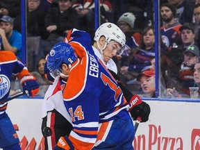 Edmonton Oilers forward Jordan Eberle collides with Curtis Lazar of the Ottawa Senators during a game at Rexall Place. (Derek Leung/Getty Images/AFP)