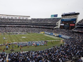 In this Oct. 25, 2015, file photo, the San Diego Chargers play the Oakland Raiders at Qualcomm Stadium in San Diego. (AP Photo/Gregory Bull, File)