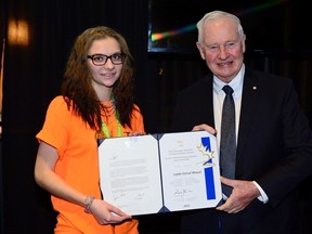 MCpl Vincent Carbonneau/Rideau Hall
Sophie Menard, a Grade 10 student at Ecole Secondaire Hanmer, receives a Caring Canadian Award from Governor General David Johnston on Tuesday in Montreal.