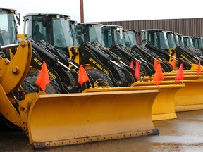 City of Toronto snowplows and snow clearing equipment sit idle in Eastern Ave yards in anticipation of some snow eventually falling on Dec. 27, 2015. (Michael Peake/Toronto Sun)
