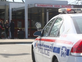 Durham Regional Police outside Dunbarton High School in Pickering on Feb. 23, 2016. (Chris Doucette/Toronto Sun)